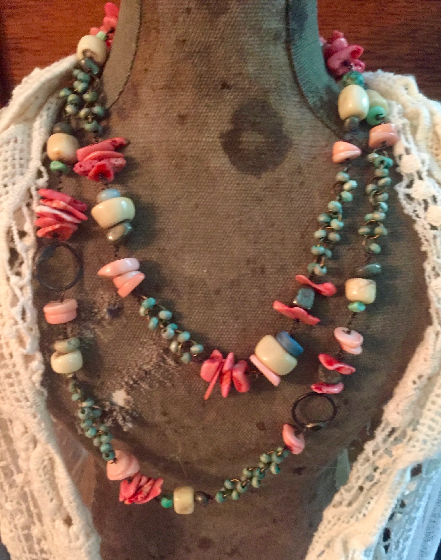 Multi-strand beaded statement necklace with turquoise and coral