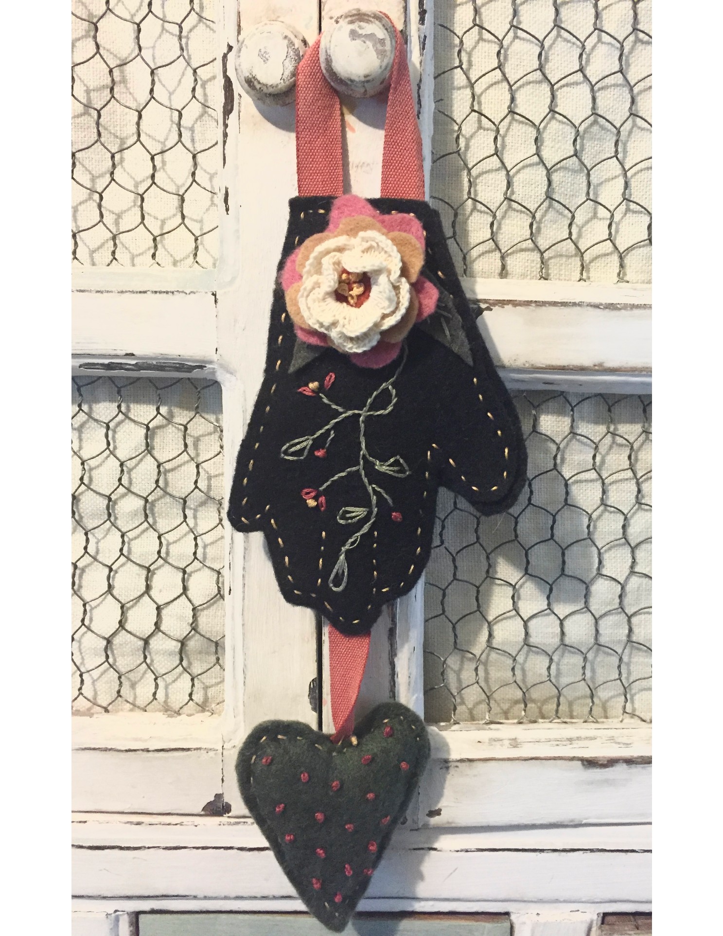 Hand-embroidered wool felt mitten ornament with crocheted flower